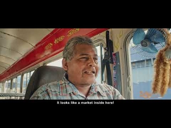 The First Car Showroom Inside a Bus